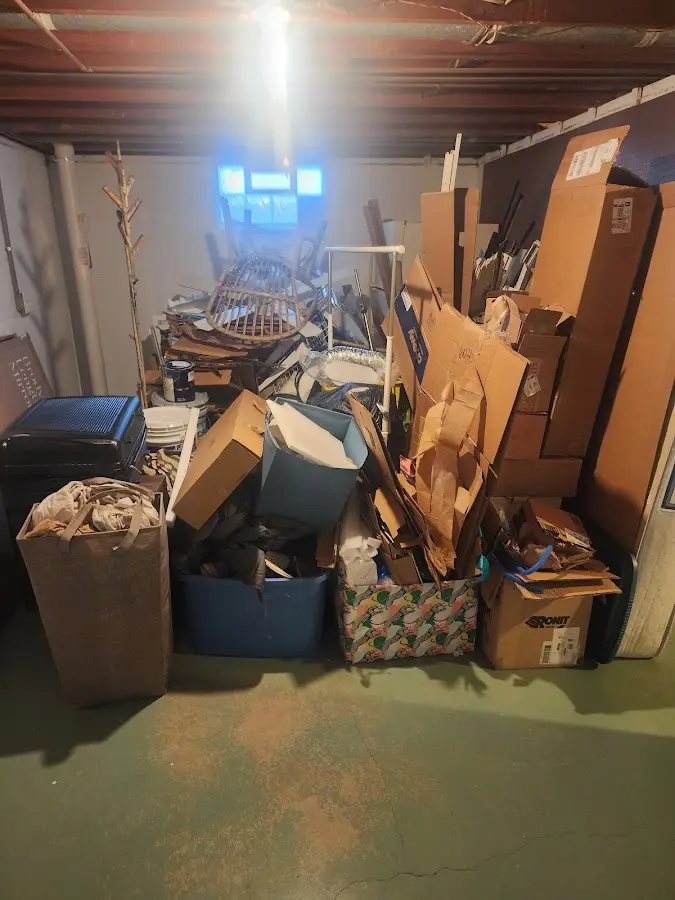 Roll-off dumpster container at job site for 2 Yard Dumpster Rental in Layhill